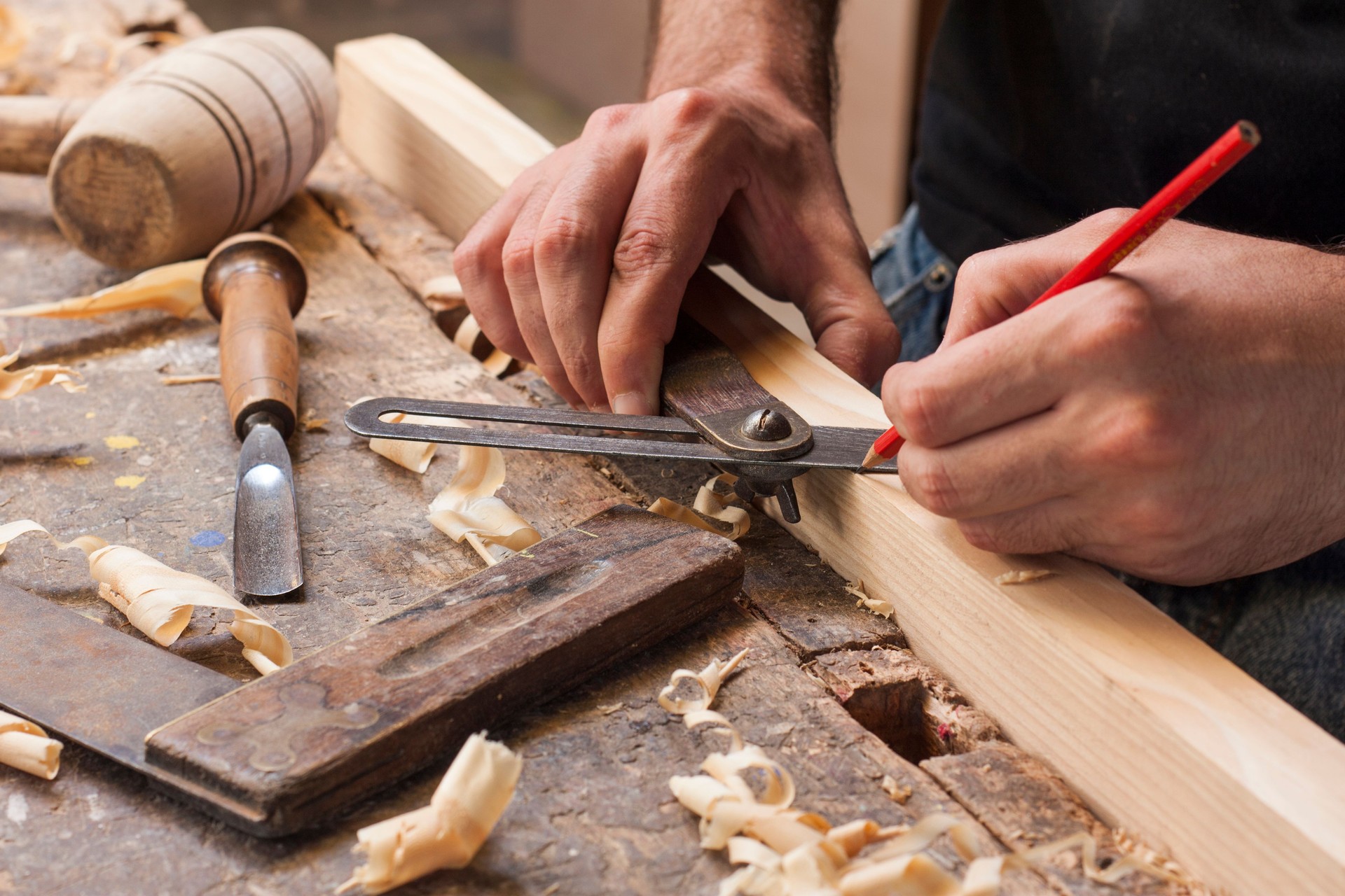 carpenter taking measurement